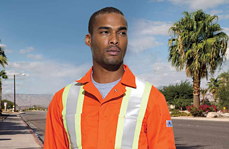 Image of Contruction worker wearing Flame Resistent bib overalls